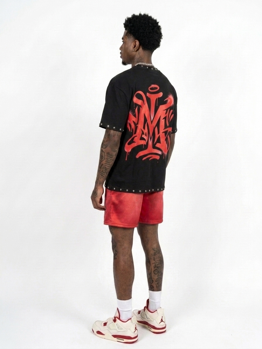 Graffiti M monogram on the back of the Superstar tee